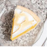 Lemon Meringue Pie · A sweet-tart lemony filling topped with light fluffy meringue; a true American tradition.