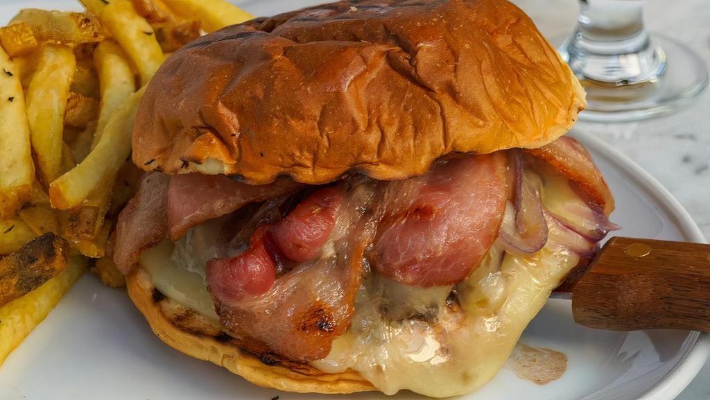 Wagyu Bacon Cheeseburger · Applewood smoked bacon, provolone cheese, sautéed onions, Hawaiian roll, served with hand-cut fries