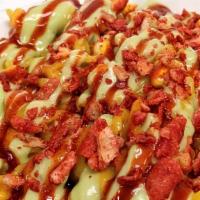 Elote Mac N' Cheez · Cheezy Mac with a Twist! Loaded with Roasted Corn, Avocado Drizz, Chamoy, and Takis