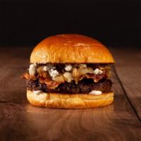 The Bacon Blue Cheese Burger · Beef patty, bacon, caramelized onions, mayo, and blue cheese crumbles on a brioche bun.