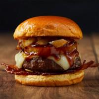 The Hawaiian Burger · Beef patty, bacon, grilled pineapple, caramelzied onions, teriyaki sauce, and melted jack ch...