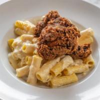 Nashville Chicken Bowl · Breaded and fried chicken breast, hot oil, rigatoni with white cheddar  & parmesan cheeses.