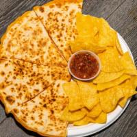 Cheese Quesadilla · Cheese on a large flour tortilla and your choice of protein.