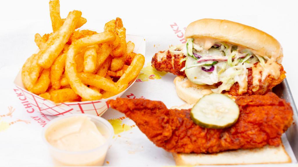 Combo 3 · One chicken slider and one tender over white bread with slaw, pickles, and choice of side.