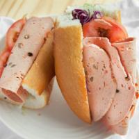 Beef Deli Sandwich · Beef deli comes inside of baguette bread that filled with our special sauce with lettuce, to...