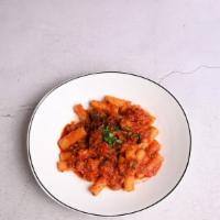 Rigatoni  Bolognese · Our meat sauce sautéed with mushrooms, onions, fresh garlic and wine.