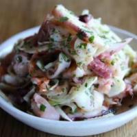 Seafood Salad · Octopus, shrimp, calamari, chili, garlic, white beans, fennel, parsley, and lemon.