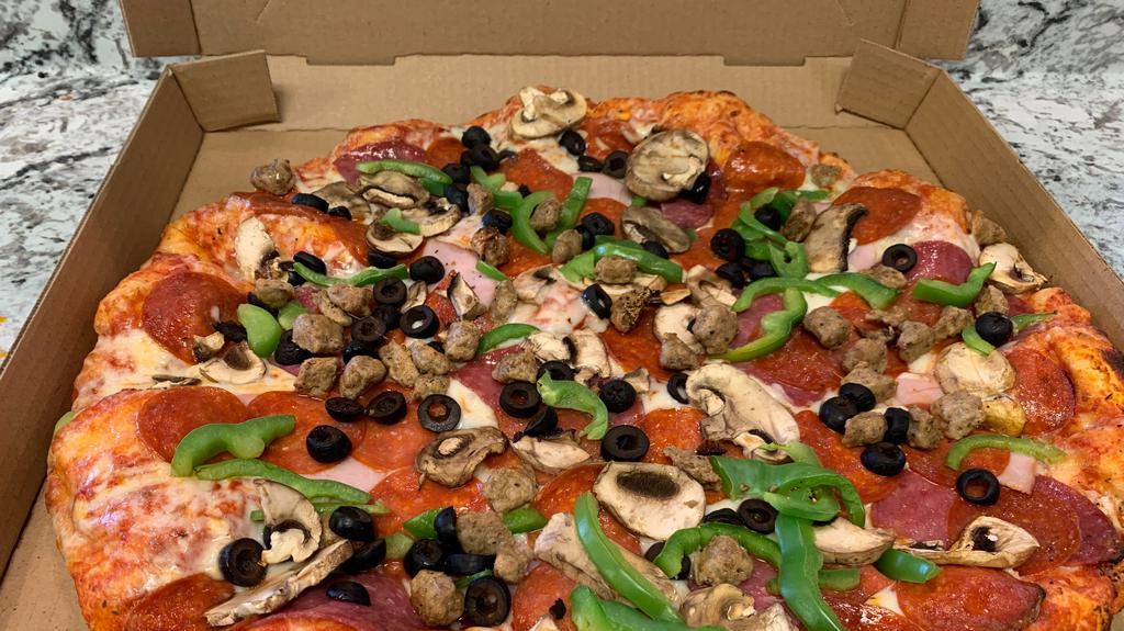 Classic Combo · Red sauce, cheese, pepperoni, sausage, Canadian bacon, olives, fresh mushrooms, bell peppers, red onion.