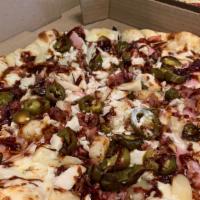 Spicy Bbq Hawaiian · White sauce, cheese, Canadian bacon, pineapple, jalapeño, bacon, chicken drizzled with BBQ s...