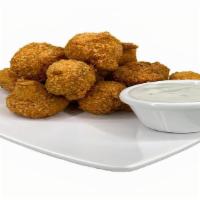 Fried Mushrooms (12 Pcs) · 12 piece. Freshly prepared Panko breaded mushroom pieces fried to perfection served with you...