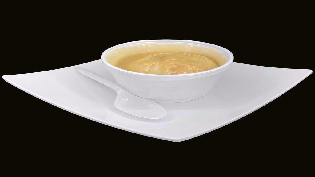 Mashed Potatoes · Freshly prepared mashed potatoes served with chunky chicken gravy.