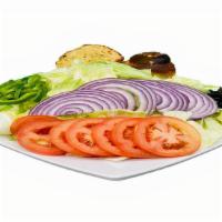 Bravo House Salad · Crispy Iceberg lettuce, Tomatoes, Red Onions, Bell Peppers and Black Olives.