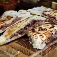 Quesadilla Plate · Cheese and delicious!! Large flour tortillas filled with melty Monterrey cheese, meat of cho...