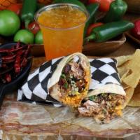 Classic Burrito Combo · One classic burrito,  chips, Salsa  and  a can soda.
