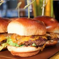 Beef Sliders (4) · Beef sliders, cheddar cheese, lettuce, tomato, garlic aioli, secret sauce, grilled onion, sw...