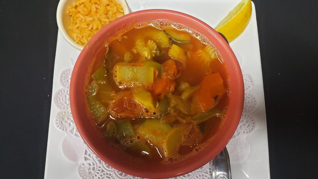 Albondigas Soup Bowl · Vegetable soup with three large meatballs (albondigas) Served with rice