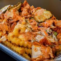 Nash And Tender Fries · Loaded Fries with Mac N'Cheese, Chicken, Coleslaw, Special Sauce, and Pickles