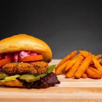 Earth Burger · Housemade vegan falafel burger served with a side of sweet potato fries.