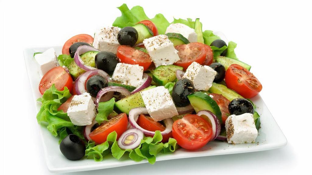 Greek Salad · A fresh mix of greens with fresh tomatoes, black olives, radishes, topped with feta cheese and Greek dressing.