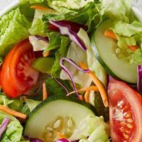 Garden Salad · Served fresh and crisp, this salad is filled with fresh juicy tomatoes, cucumbers, romaine a...