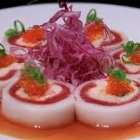 Radish Roll(No Rice Roll) · Tuna, yellowtail, salmon, avocado, gobo and kaiware wrapped with pickled radish, ponzu sauce