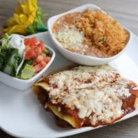 Enchilada Combo Plate · 3 tortillas rolled with choice of protein and melted cheddar cheese and topped with enchilad...