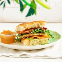 Arugula Egg · Focaccia, fig jam, egg, Cheddar, arugula, applewood smoked bacon.