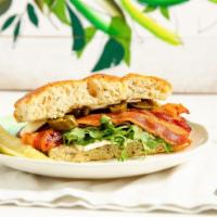 Bacon Brie Panini · Ciabatta, brie, fig jam, arugula, applewood smoked bacon.