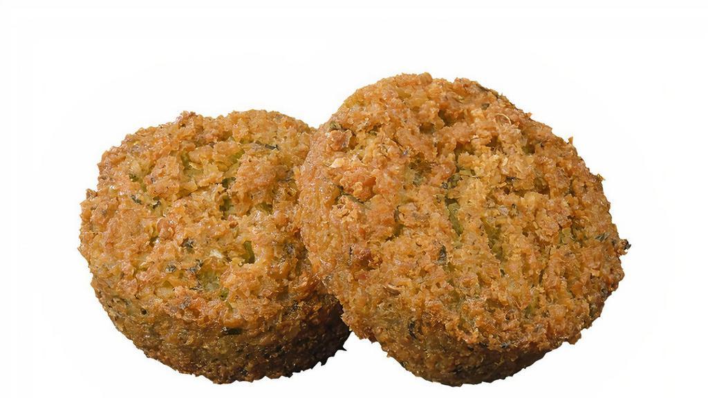 Falafel (2) · 2 pieces of the deep-fried ball made from ground chickpeas and a blend of herbs and spices. Allergen: Contains Soy