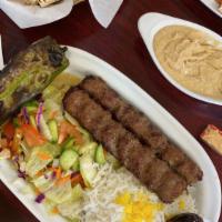 Luleh Kebab · Two skewers ground beef, mixed with spices and charbroiled.