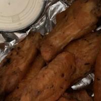 Chicken Wings (8) · Crisp, hormone free chicken wings served with your choice of traditional buffalo sauce (mild...