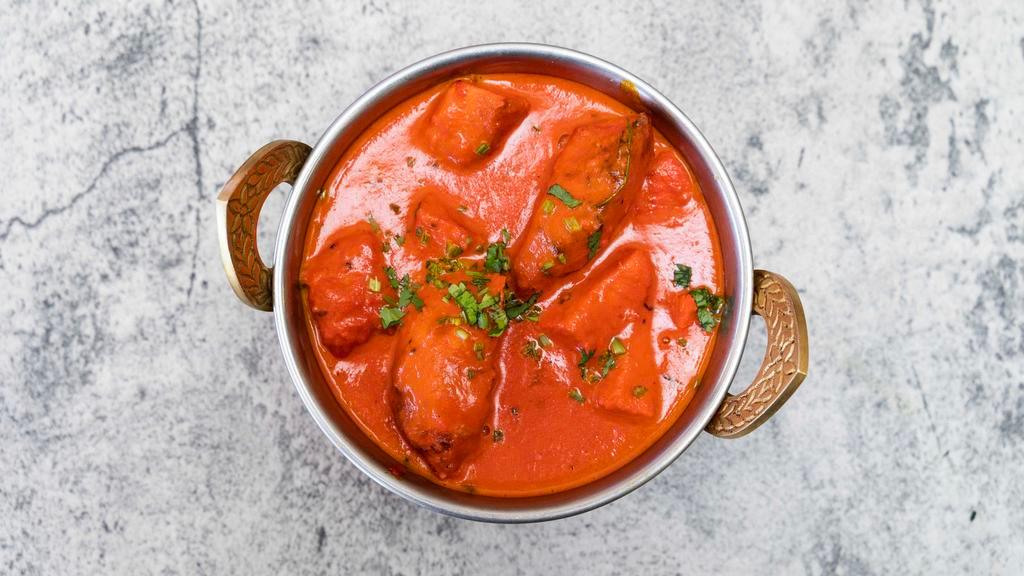 Chicken Tikka Masala · Barbecued boneless chicken breast sautéed with herbs and spices.