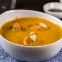 Malai Kofta · Vegetable and cottage scene dumplings simmered in a savory gravy of onions and tomatoes garl...