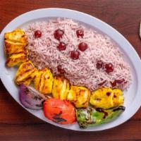 Albaloo Polo · Basmati rice mixed with sour cherries served with chicken kabob.