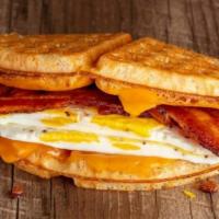 Bacon, Egg & Cheddar · 2 Large Overhard Eggs, Applewood Smoked Bacon, Melted Cheddar, Mayo