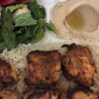 Chicken Shish Kebab Plate · Served with rice, salad, hummus  garlic sauce and pita bread