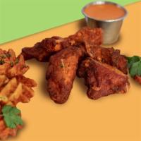 ½ Dozen Chicken Wing Pack · Marinated Chicken Wings, Served with Waffle Fries, Choice of Sauce.