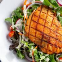 Cajun Salmon Salad · Grilled salmon topped with cajun style served with spring mix, cherry tomato, red onion, rad...