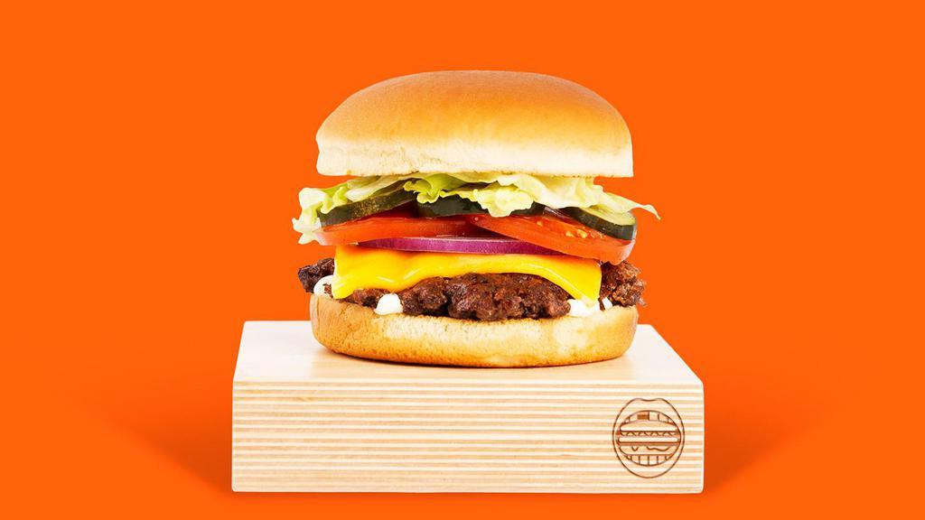 Cheese Smashmouth · Our signature smashed hamburger patty topped with American cheese, lettuce, tomato, onion, pickles, and mayo.