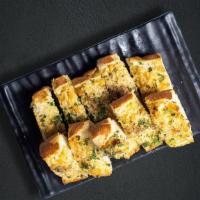 Good Old Garlic Cheese Bread · (Vegetarian) Housemade bread toasted and garnished with butter, garlic, mozzarella cheese, a...