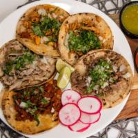 Taco · Tacos Arandas Food Truck favorite: Your choice of meat topped with onions and cilantro.
