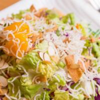 Chinese Chicken Salad · Crisp iceberg, marinated chicken breast, julienne-cut carrots, scallions, shaved cabbage, ro...