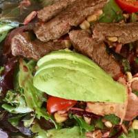Steak Salad · Organic baby field greens, Persian cucumbers, grape tomatoes, fire-roasted corn, baked beets...