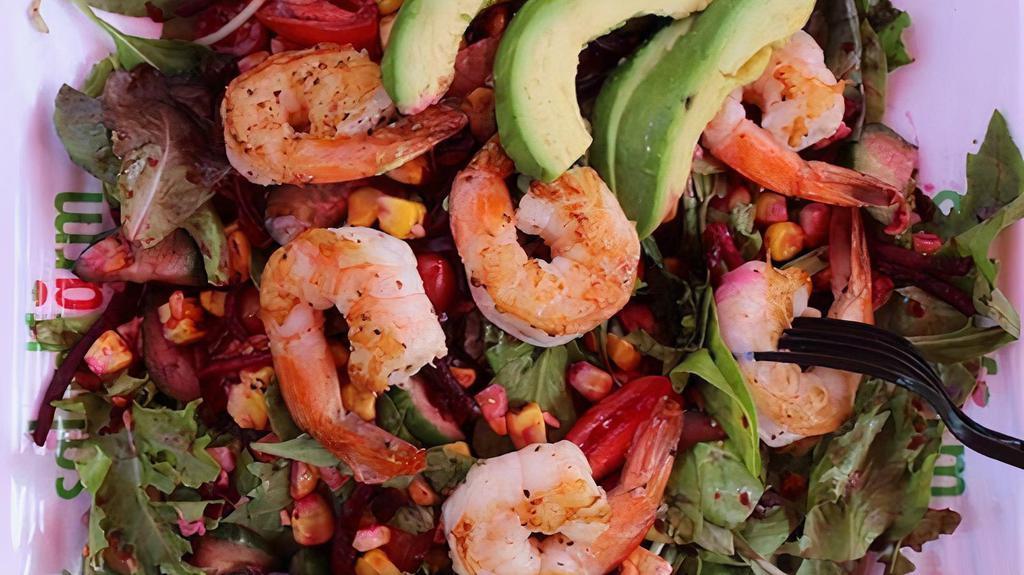 Shrimp & Avocado Salad · Organic baby field greens, grape tomatoes, fire roasted corn, baked beets, marinated grilled shrimp, and hass avocado, served with lemon herb dressing.