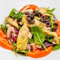 Artichoke Salad · Mixed greens lettuce, artichoke hearts, black olives, mushroom, tomatoes, red wine dressing.