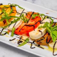 Caprese · Heirloom tomatoes, fresh mozzarella cheese, basil, olive oil, balsamic.