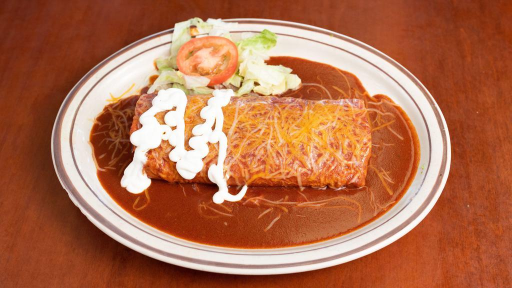 Wet Asada Burrito · Served with rice, beans, onions, cilantro, green or red sauce, and cheese.