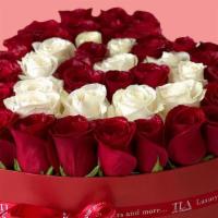Heart Shaped Box With Fresh Roses  · Heart shaped box with over 3 dozen of fresh roses will make your Valentines day unforgettable.