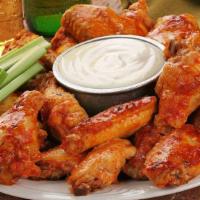 Chicken Wings · Fried chicken wings choice of sauce and dressing