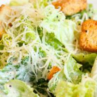 Caesar Salad · Romaine, Caesar dressing, croutons, and Parmesan.